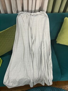 Silver Shimmer jumpsuit with Drawstring Waist and shoulders.